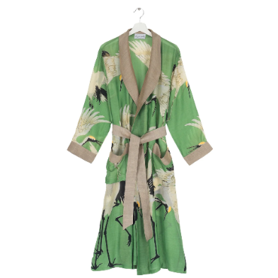 A green kimono-style robe with a bird print and beige trim, hanging on a white hanger against a plain white background.