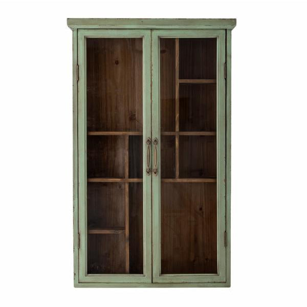Green wooden cabinet with glass doors on a white background