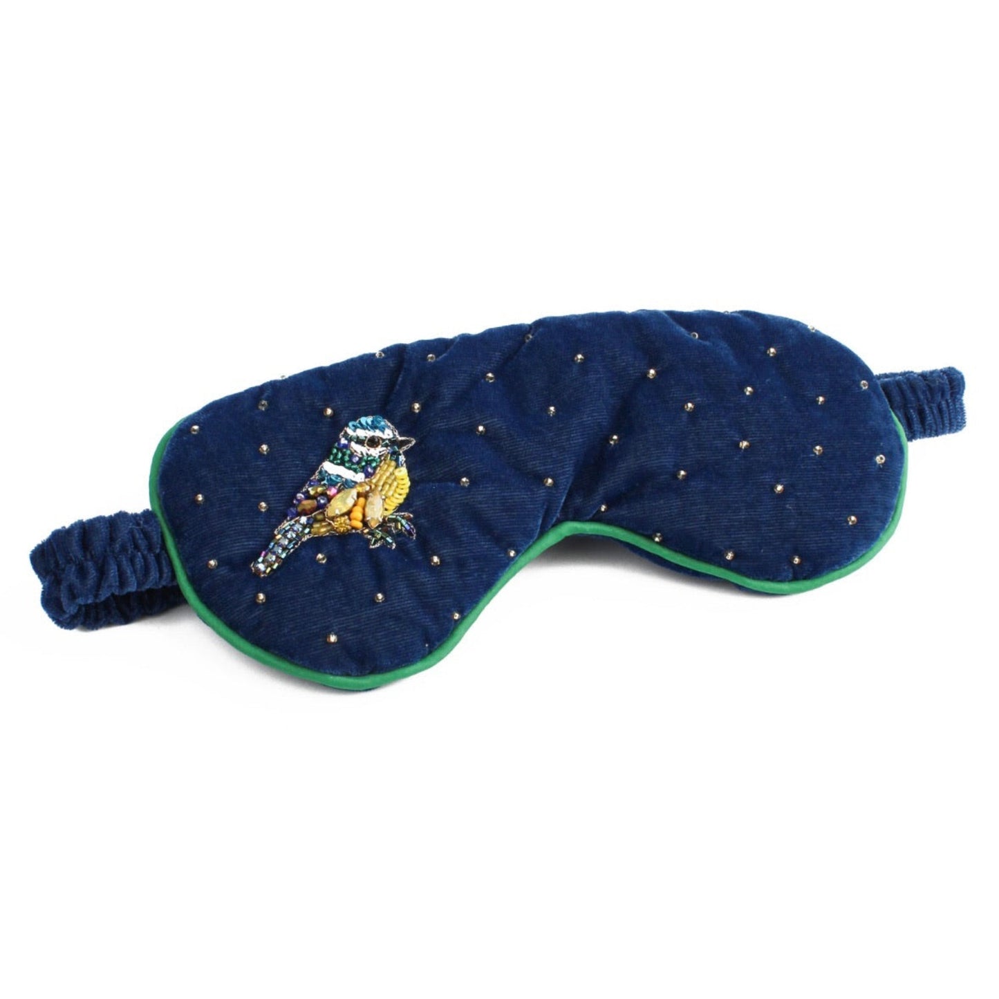 Navy blue sleep mask with a bird design on a white background